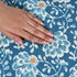 Detail of handcrafted block print on cotton boho pillow cover