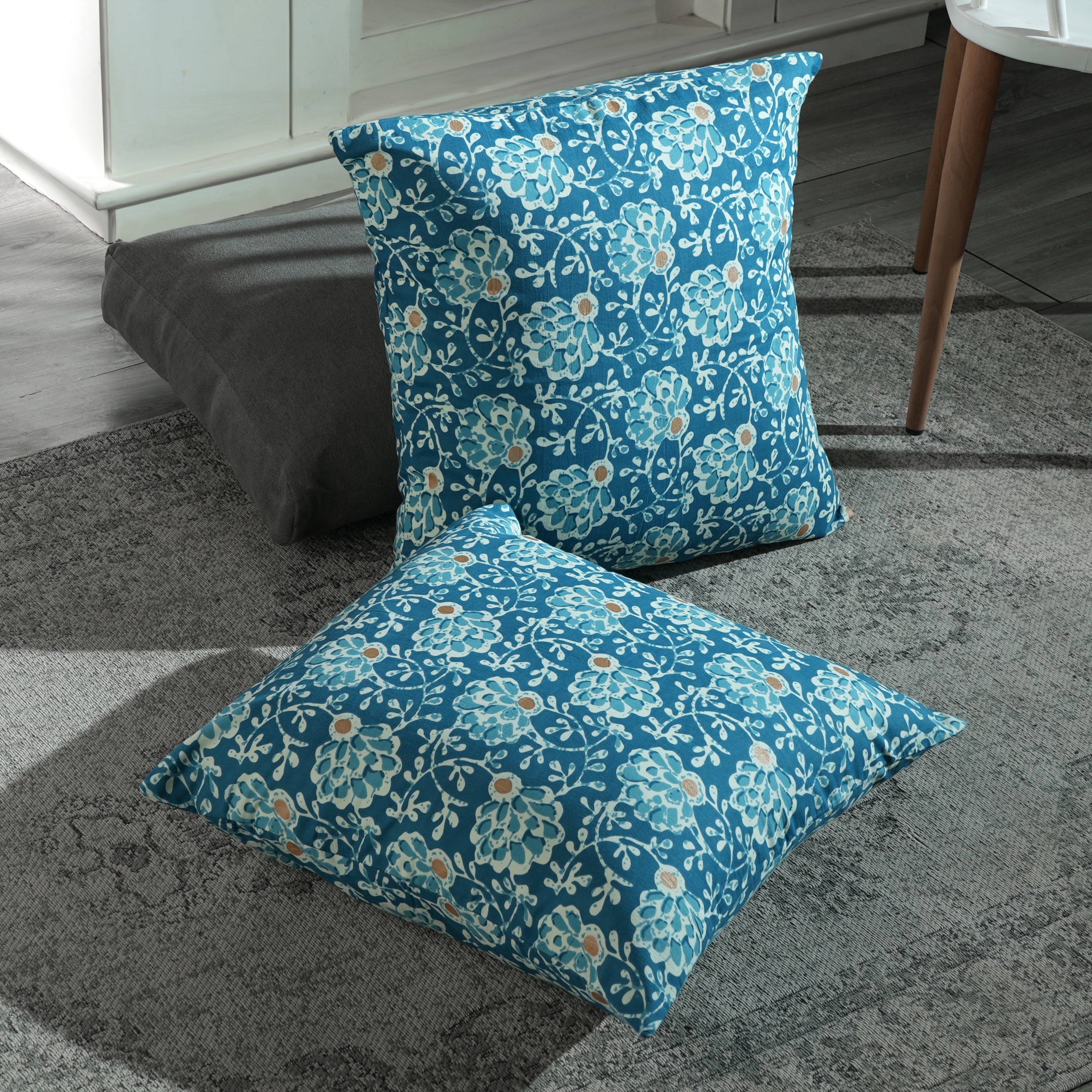 Artisanal boho-style pillow covers with intricate patterns and soft cotton texture