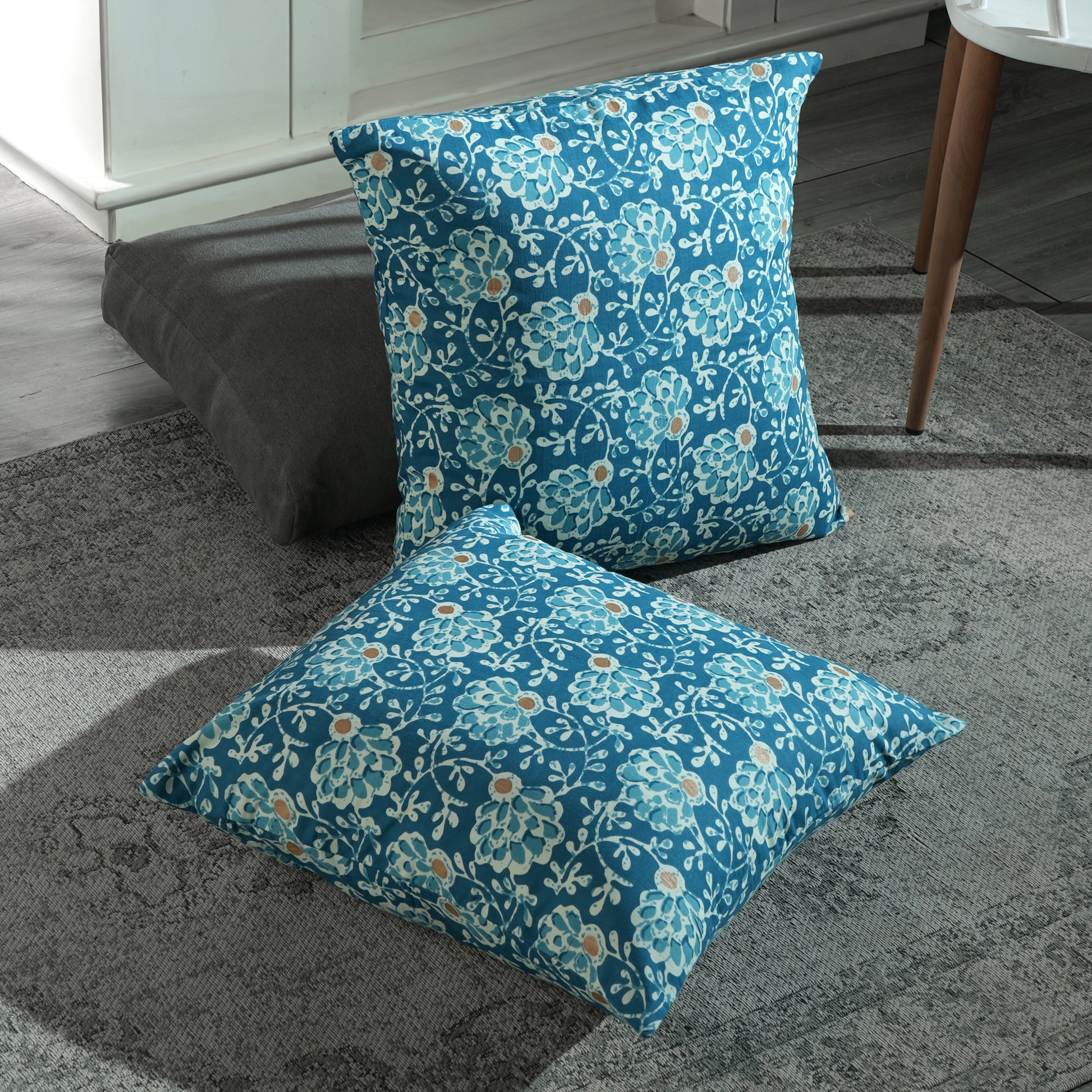 Artisanal boho-style pillow covers with intricate patterns and soft cotton texture