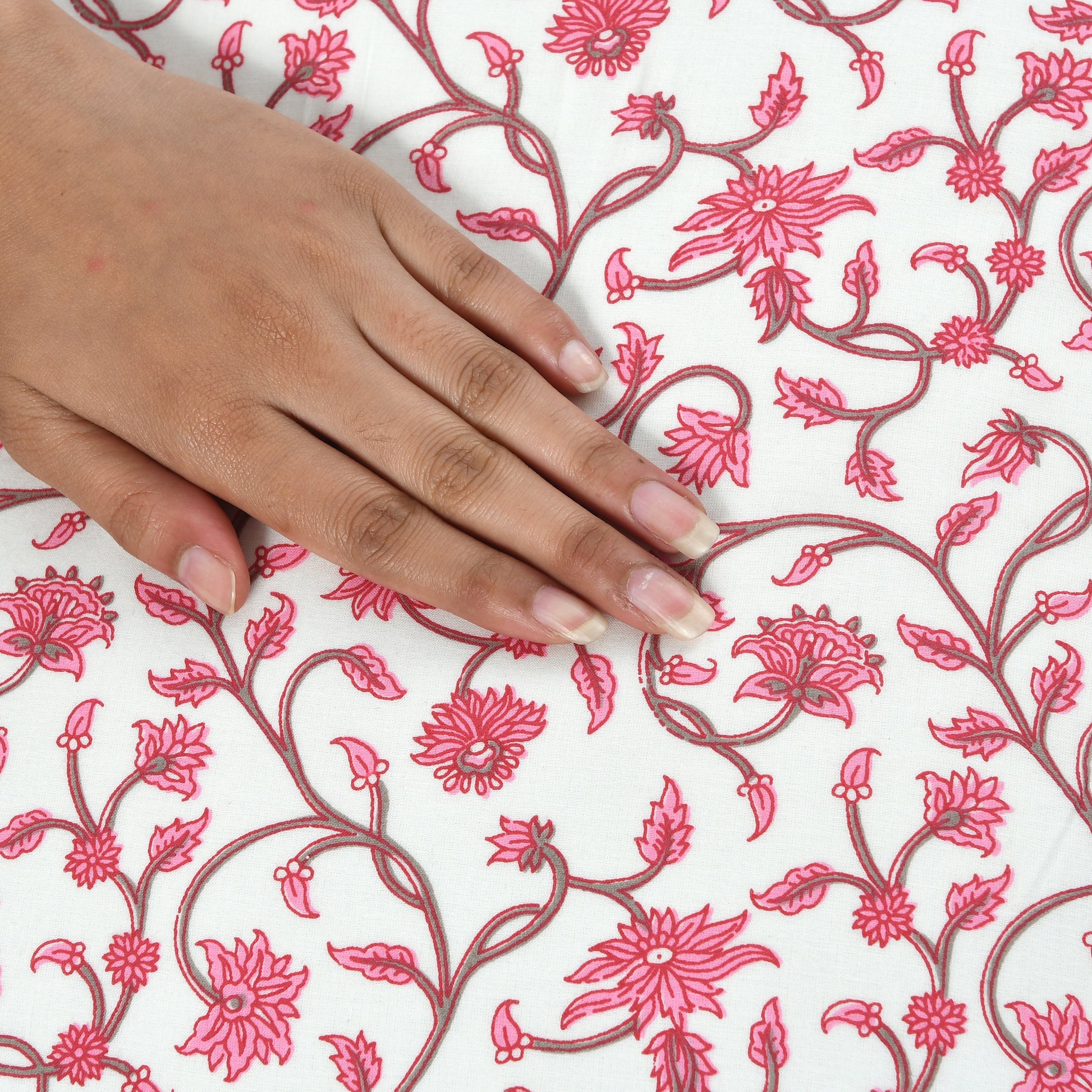 Detail of handcrafted block print on cotton boho pillow cover