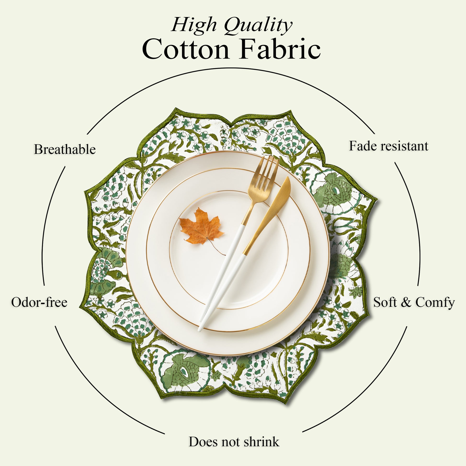 Layered tablescape with embroidered green cotton placemat