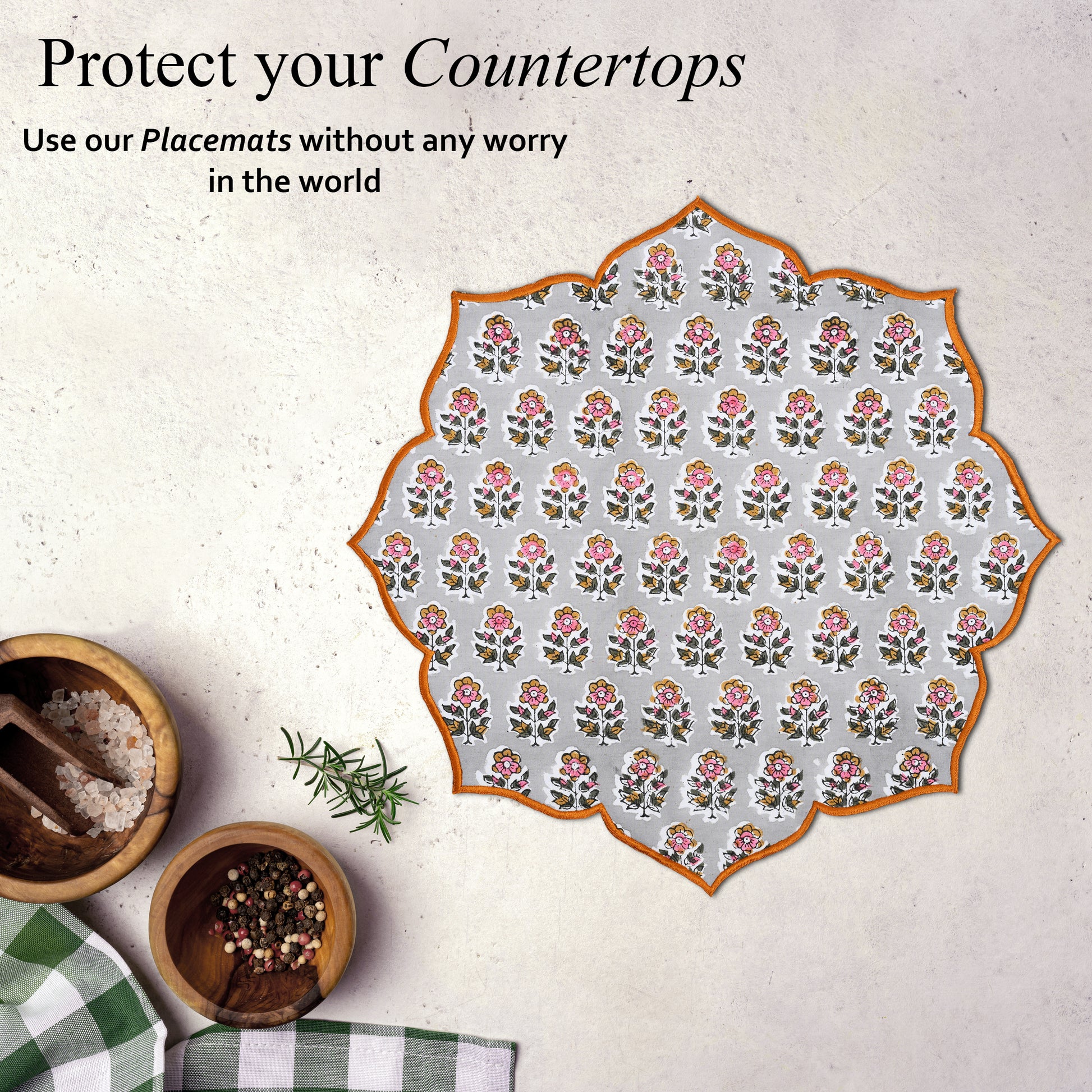 Cool-toned placemat with soft texture and embroidery