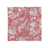 Red floral block-printed napkin laid flat on white background.
