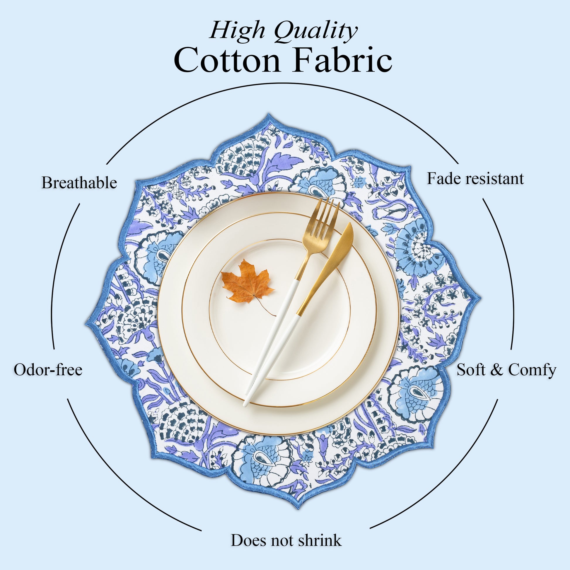 Dramatic tablescape with deep blue embroidered placemat