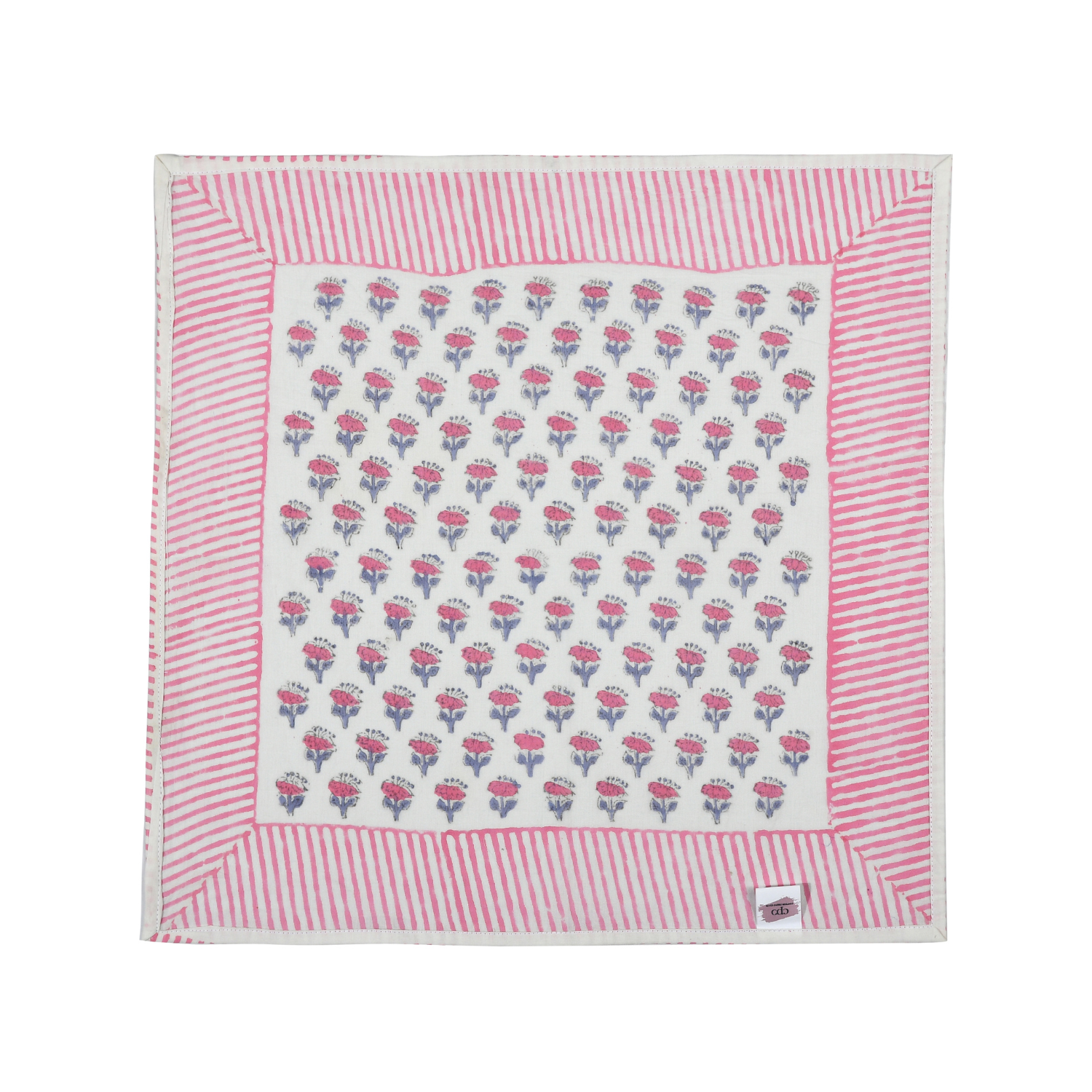 Single flat lay of pink and white floral cotton napkin.