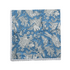 Single flat lay of blue and white floral cotton napkin.
