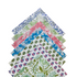 Stack of block-printed napkins in assorted colors with patterned edges.