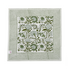 Green botanical block-printed cotton napkin in close-up.