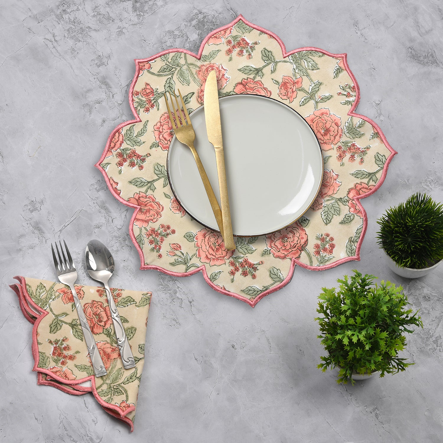 Radiant rose handblocck printed 100% cotton fire opal placemat styled with gold utensils