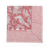 pink botanical block-printed cotton napkin in close-up.