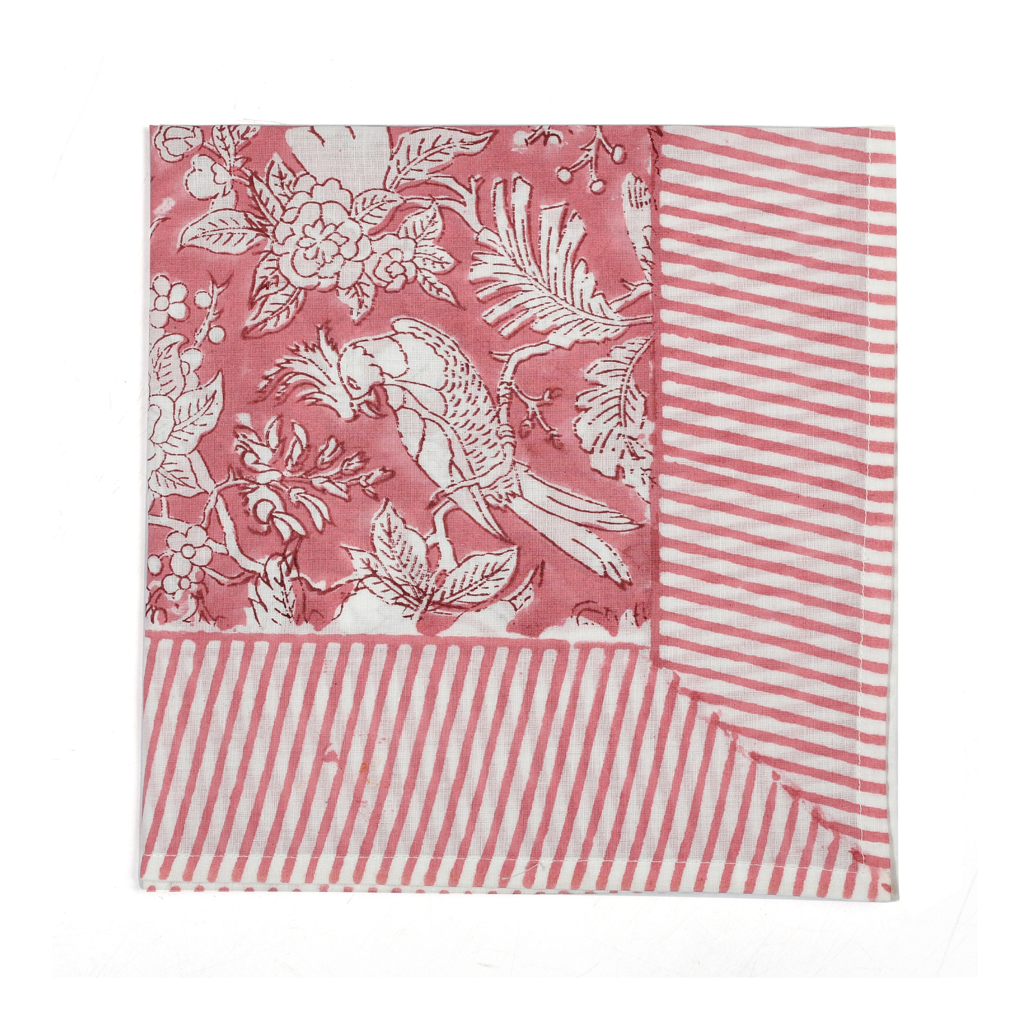 pink botanical block-printed cotton napkin in close-up.
