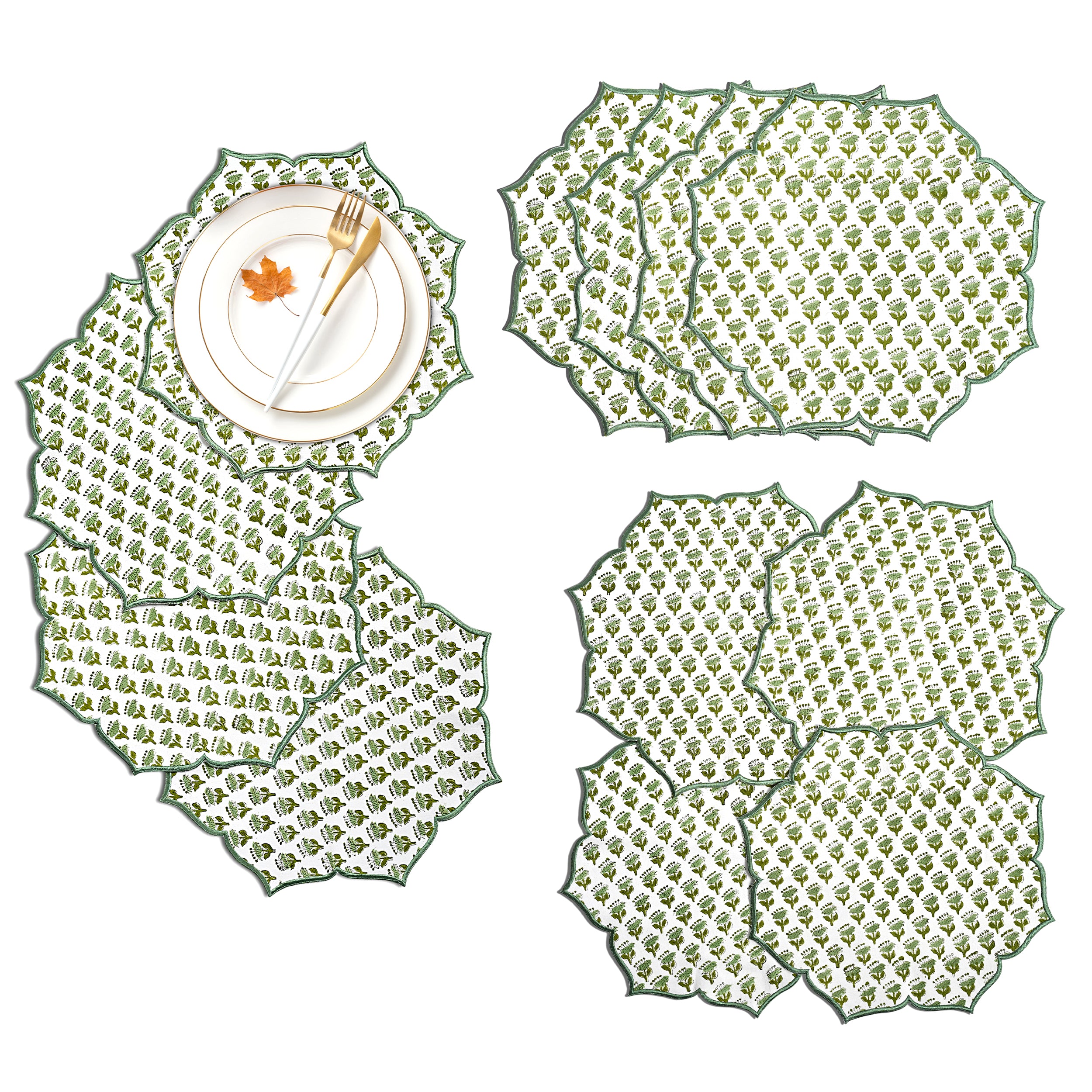 Emerald embroidered placemat styled with gold flatware