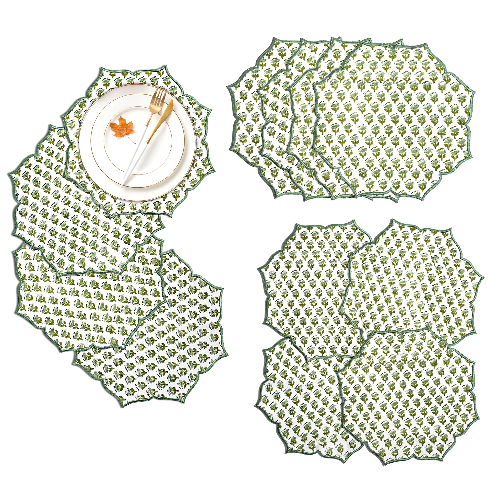 Emerald embroidered placemat styled with gold flatware