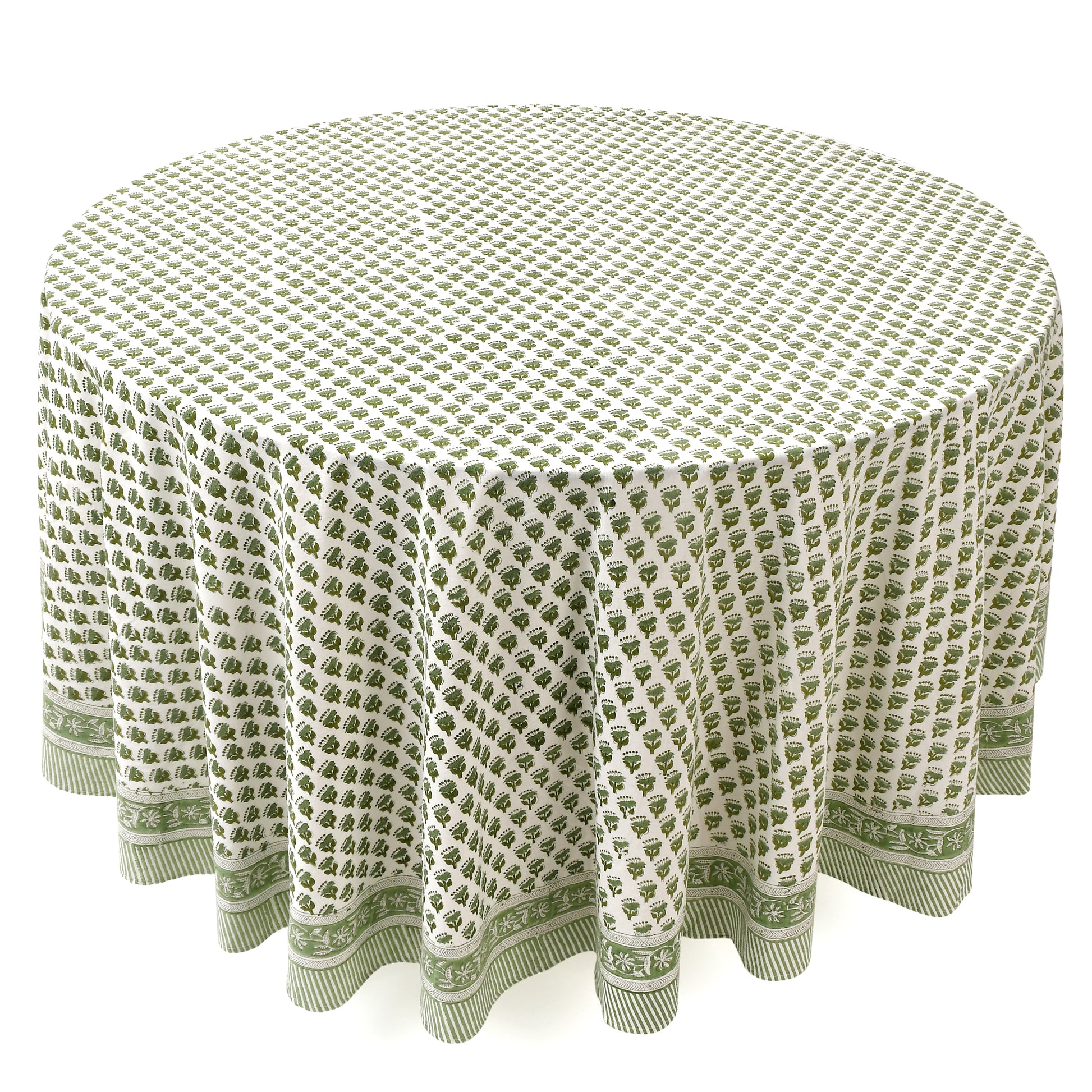 a round table with a green tablecloth on it