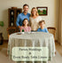 a round table with a green tablecloth on it