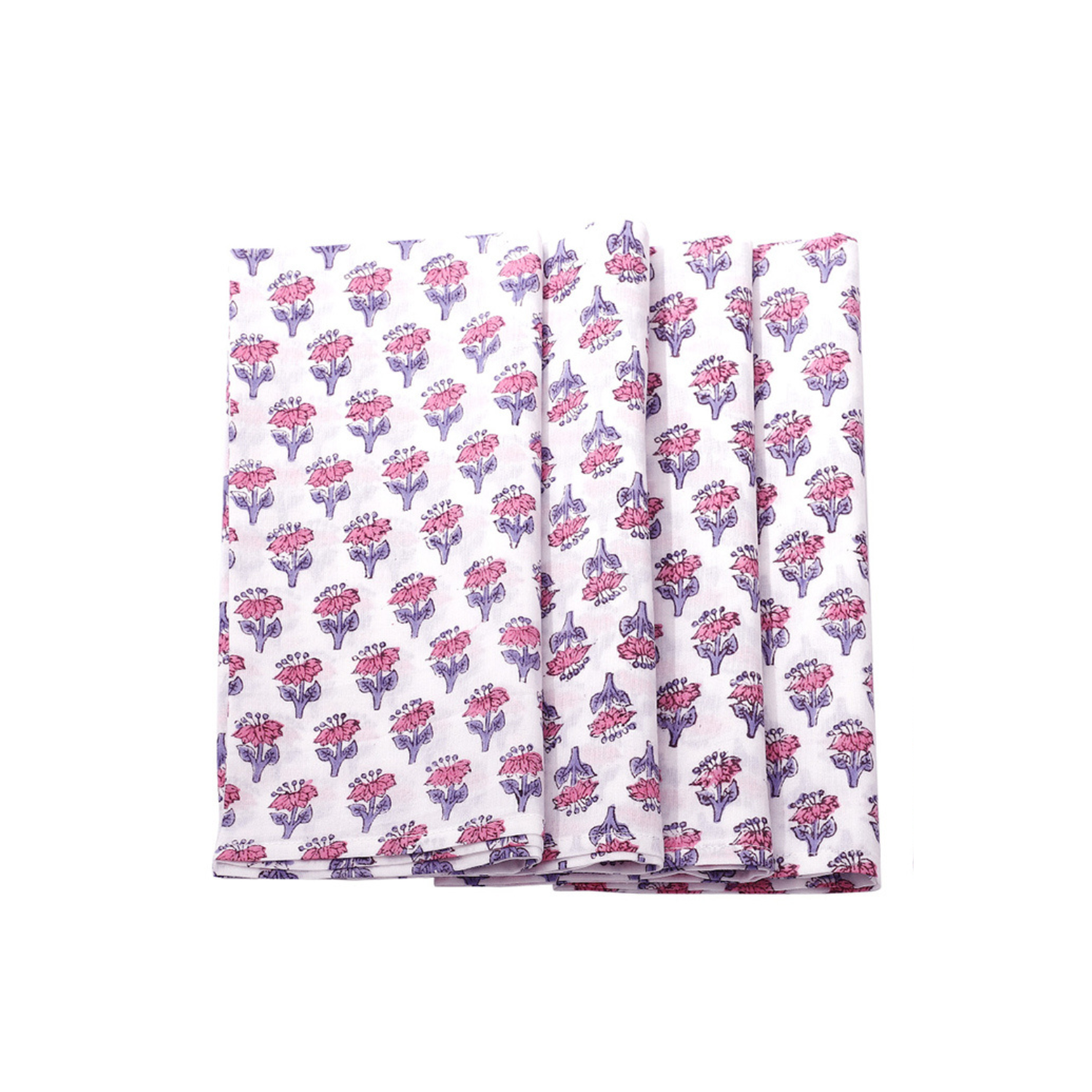 A set of folded cotton cloth napkins with a hand-printed floral and geometric design in pink and purple colors on a white background.