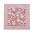 pink botanical block-printed cotton napkin in close-up.
