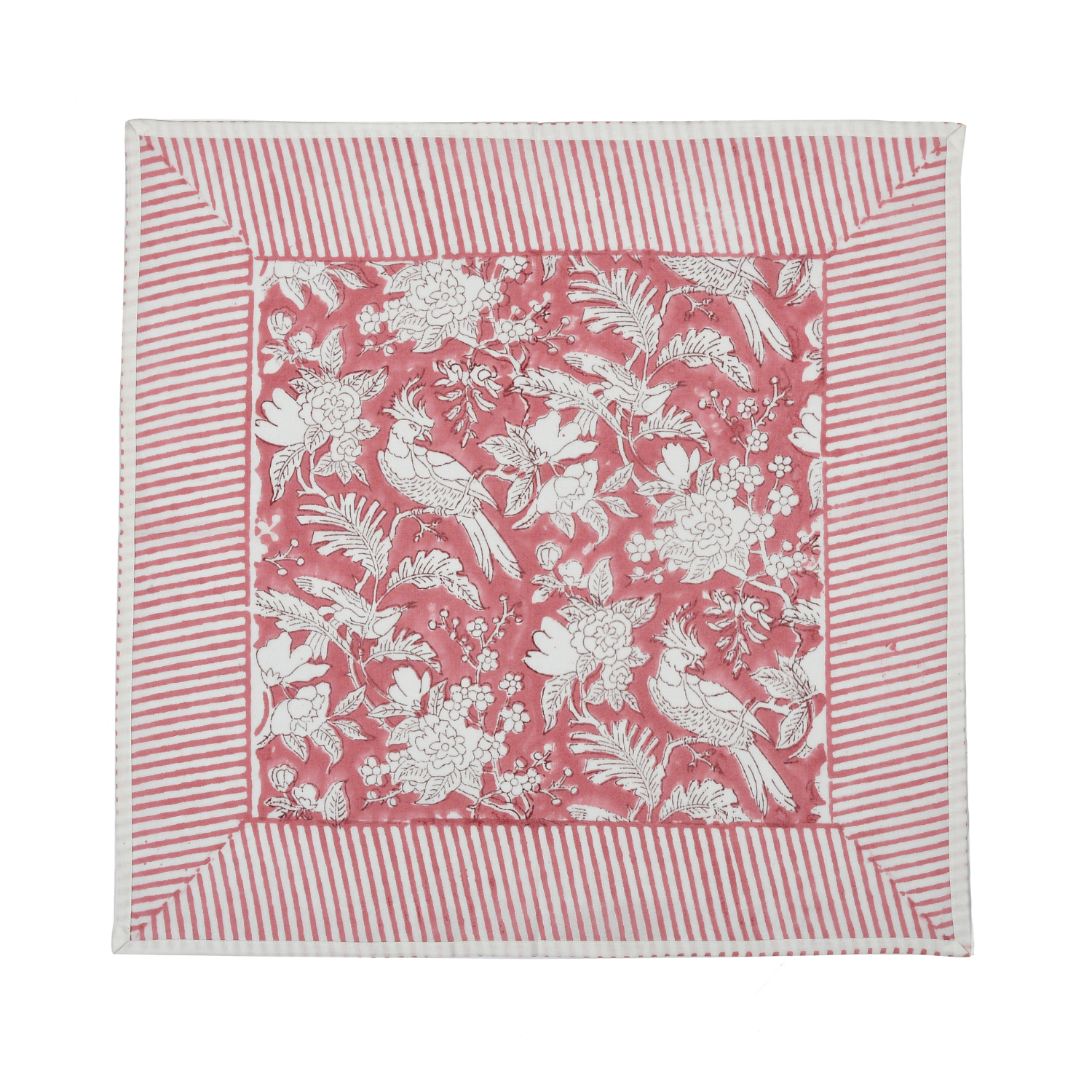 pink botanical block-printed cotton napkin in close-up.