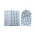 Six blue floral napkins displayed in a fan arrangement with a single folded one in the center holding silverware.