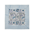 blue botanical block-printed cotton napkin in close-up.
