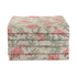 Stack of neatly folded tan and pink floral napkins on a white background.