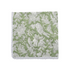 Single flat lay of green and white floral cotton napkin.