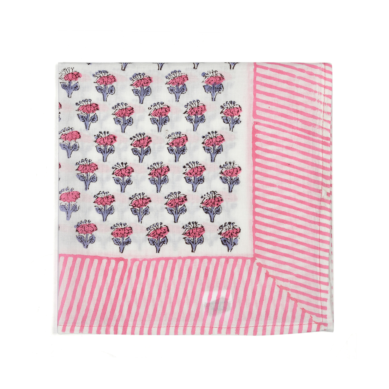 Single flat lay of pink and white floral cotton napkin.