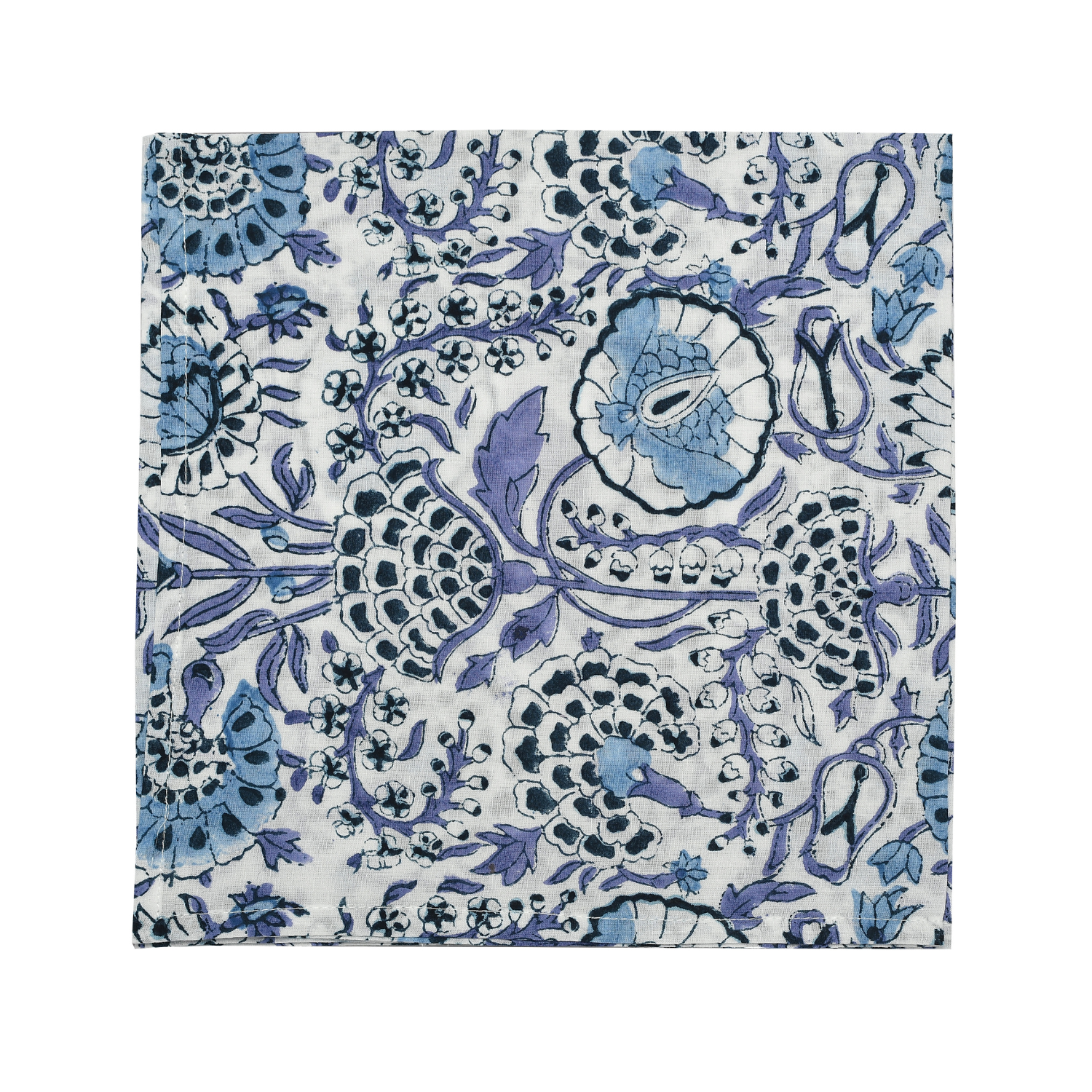 blue floral block-printed napkin laid flat on white background.