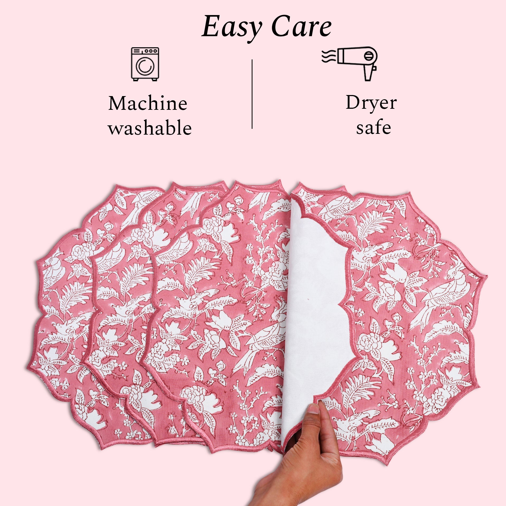 machine washable and dryer safe vScalloped coral pink placemat styled with bird accents