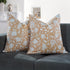 Set of 2 boho pillow covers displayed on neutral couch
