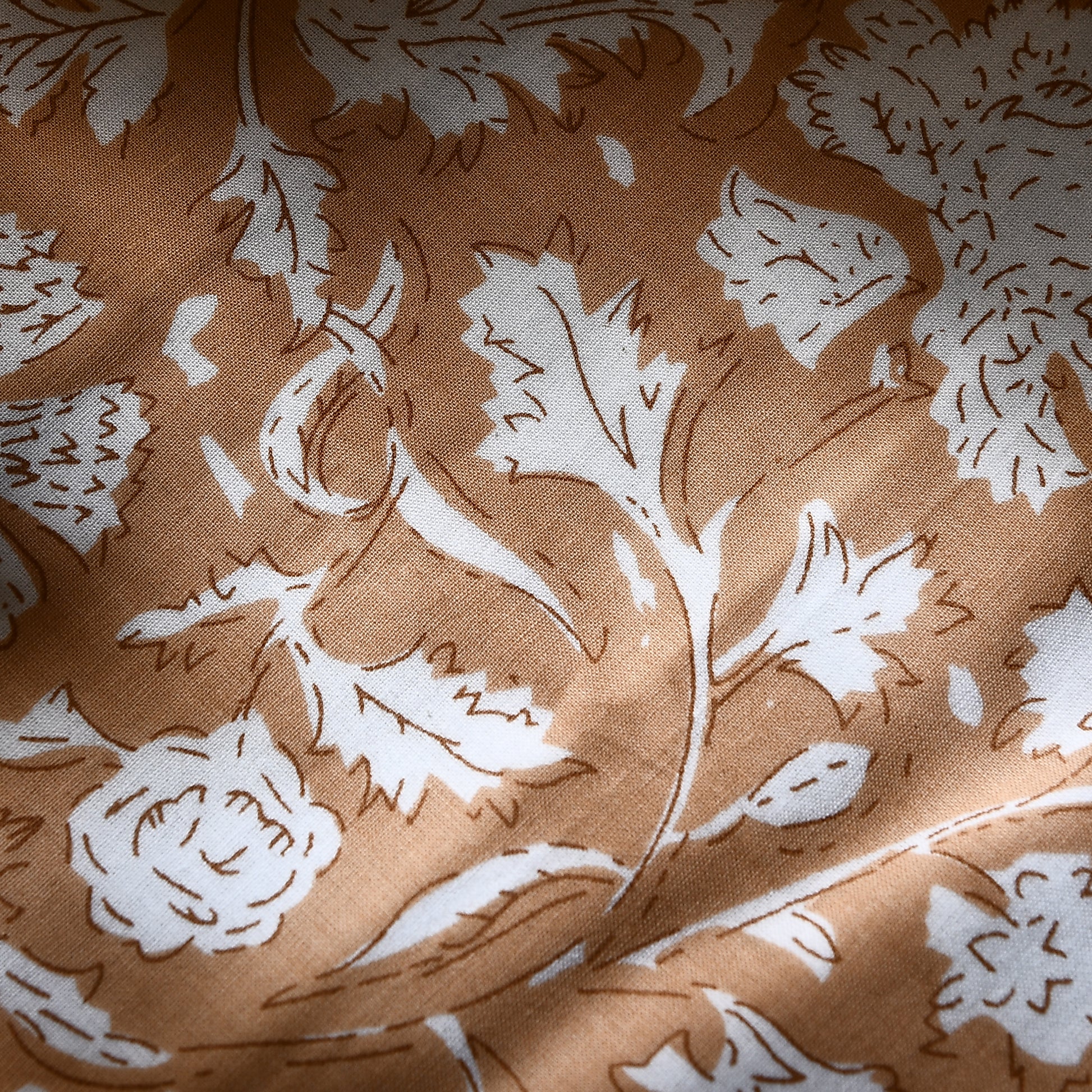 Close-up of hand-block printed cotton pillow cover with hidden zipper
