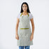 Vintage-inspired green and white apron with a floral print