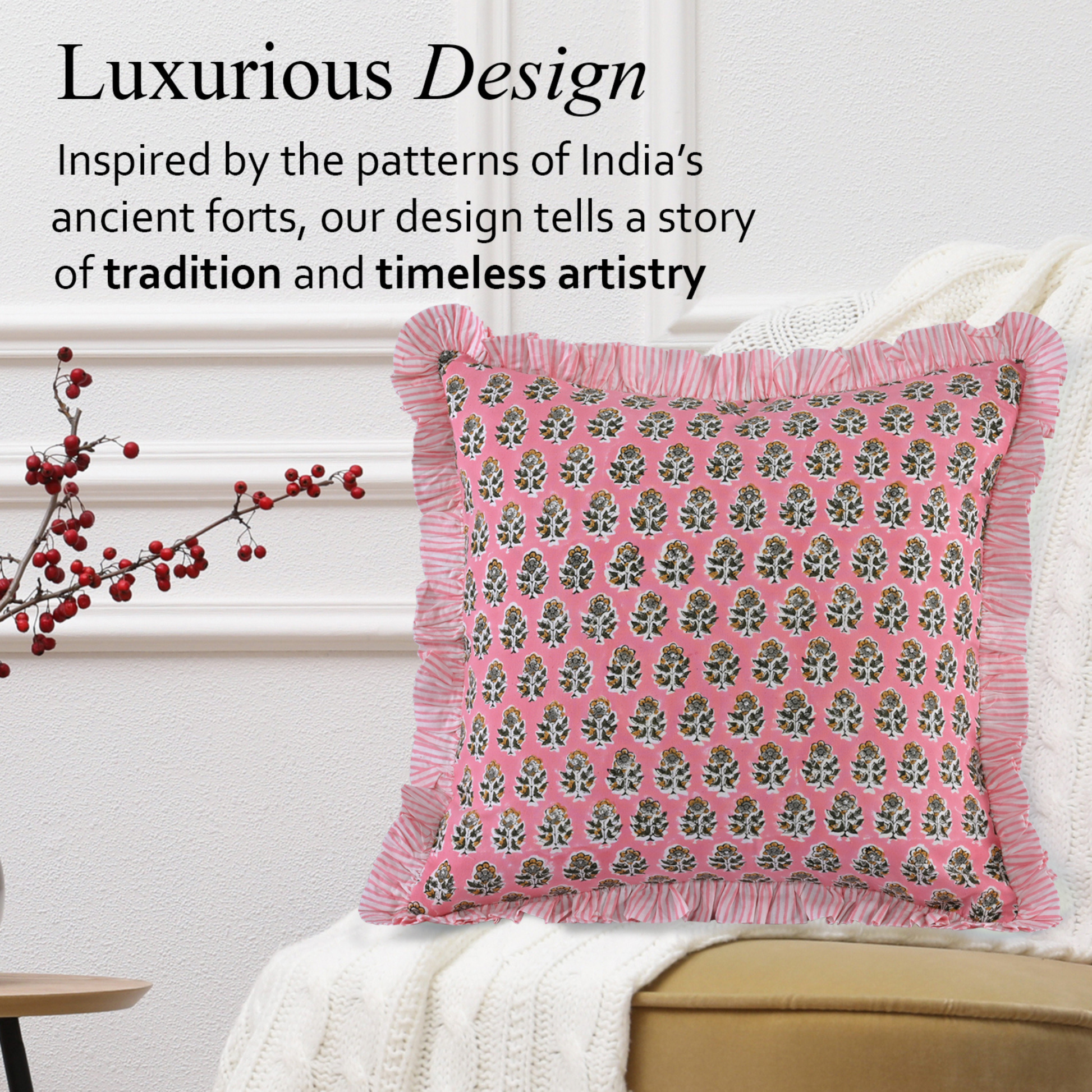 pink floral pillow with beige fringe trim displayed against a soft beige background showing fabric details.