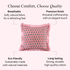 pink floral pillow with beige fringe trim displayed against a soft pink background showing fabric details.