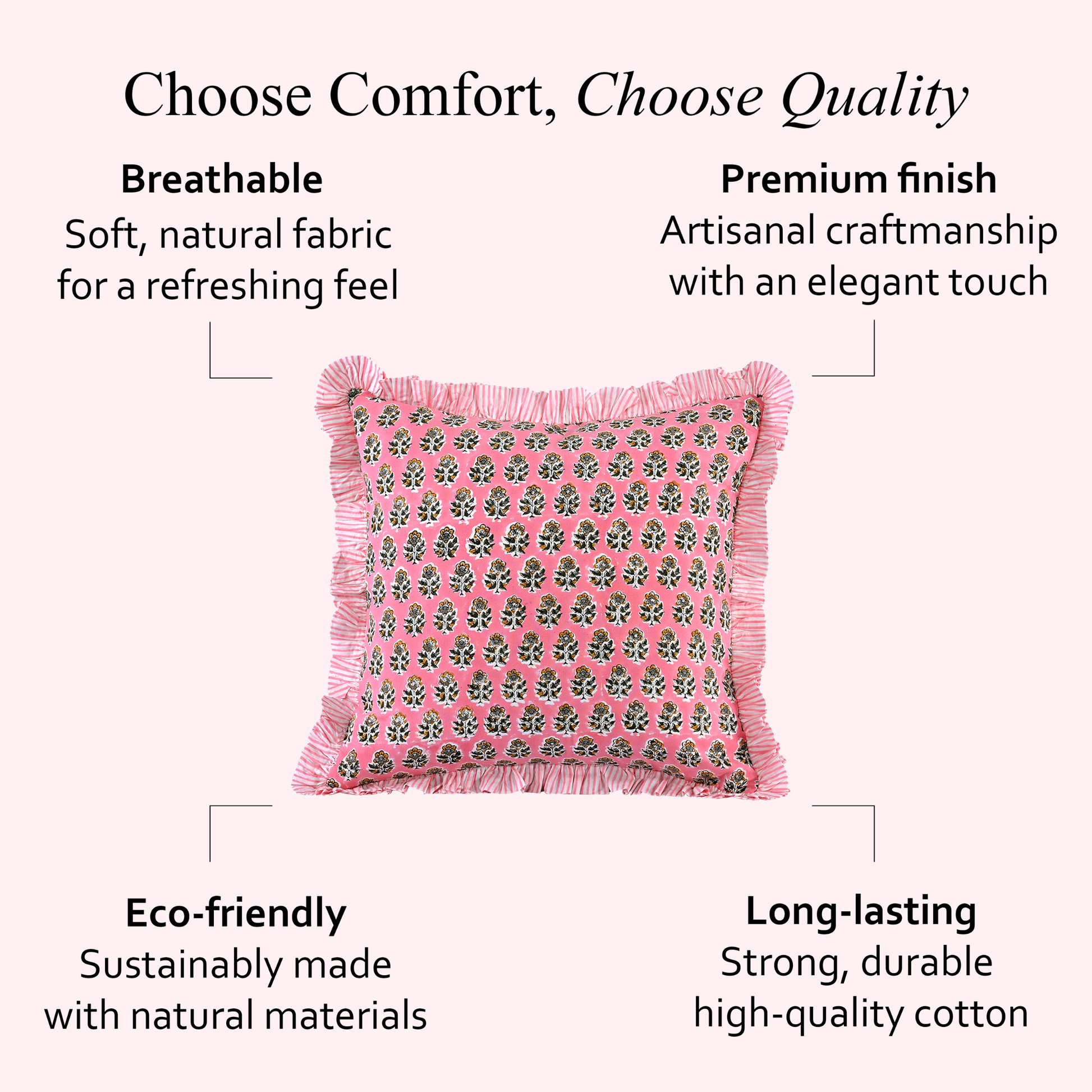 pink floral pillow with beige fringe trim displayed against a soft pink background showing fabric details.