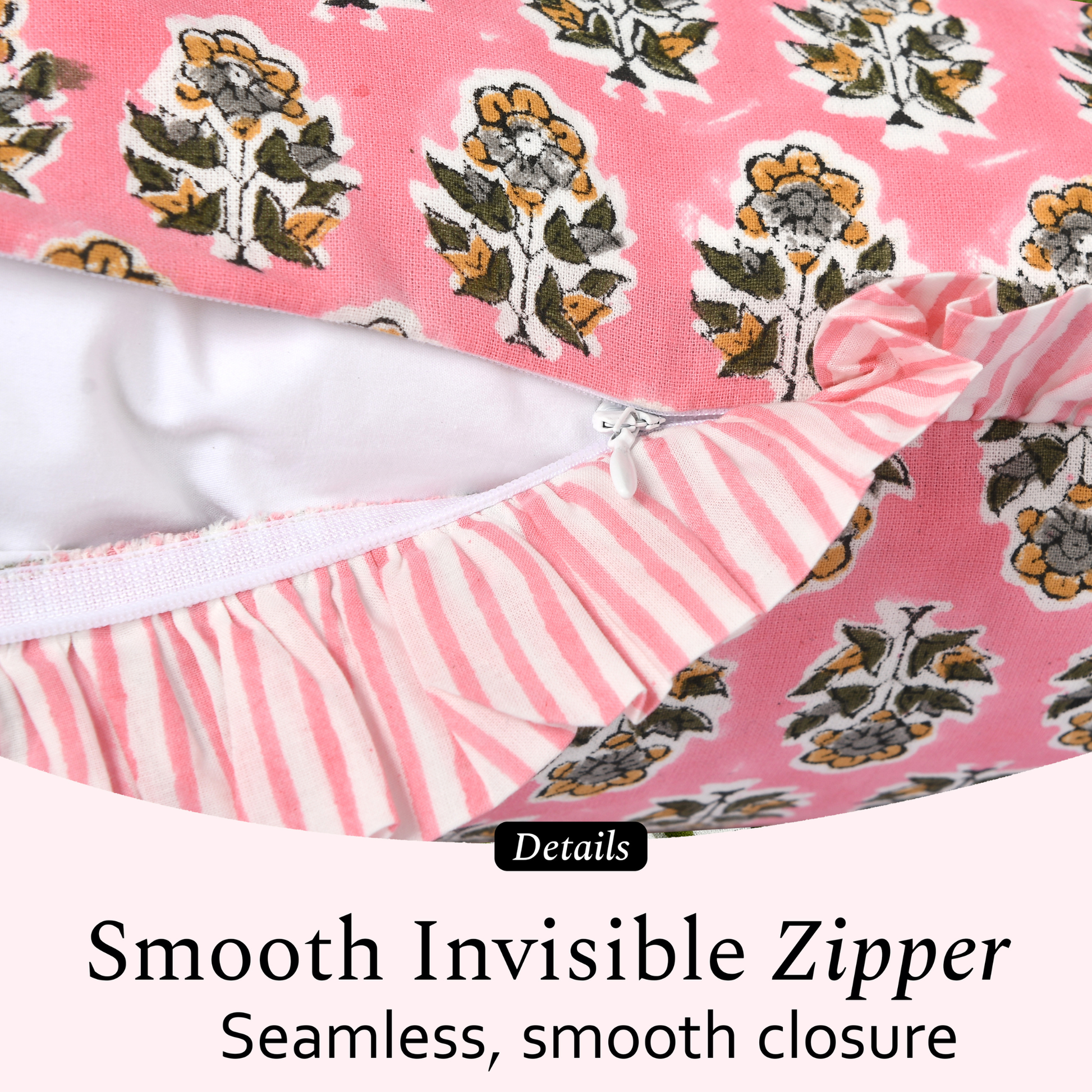 Close-up of a smooth invisible zipper on a decorative pillow cover with floral block print fabric.
