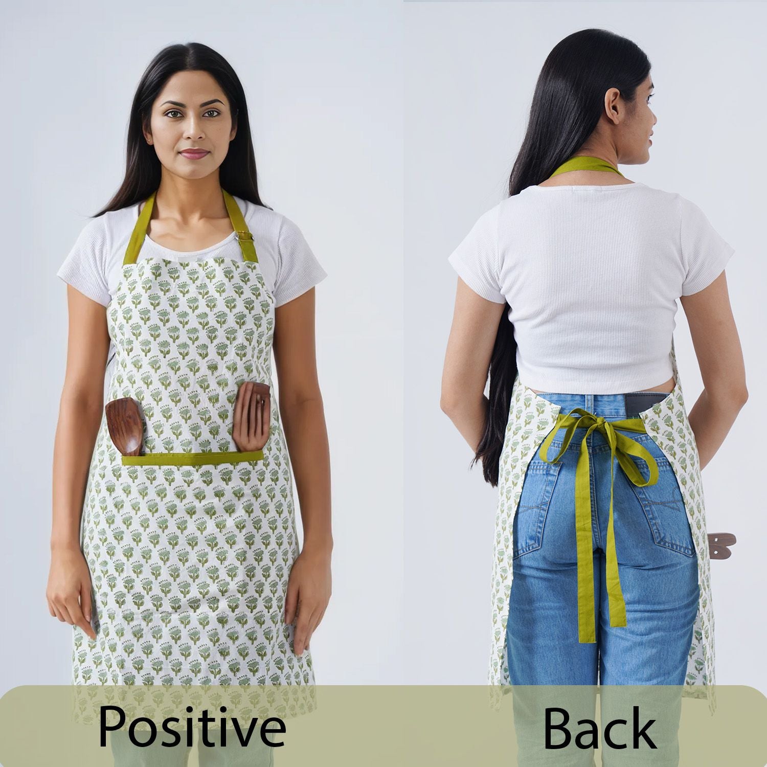 Green and white botanical apron with waist tie and front pockets