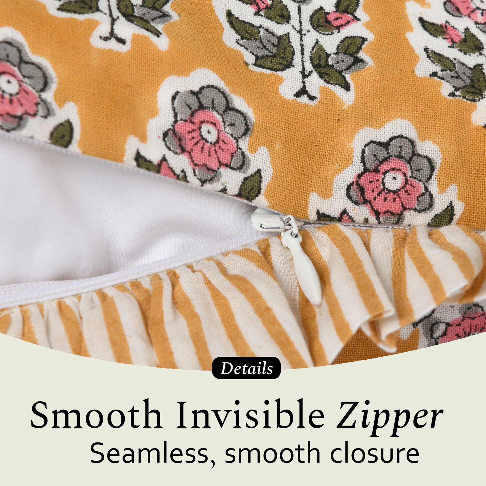 Close-up of a smooth invisible zipper on a decorative pillow cover with floral block print fabric