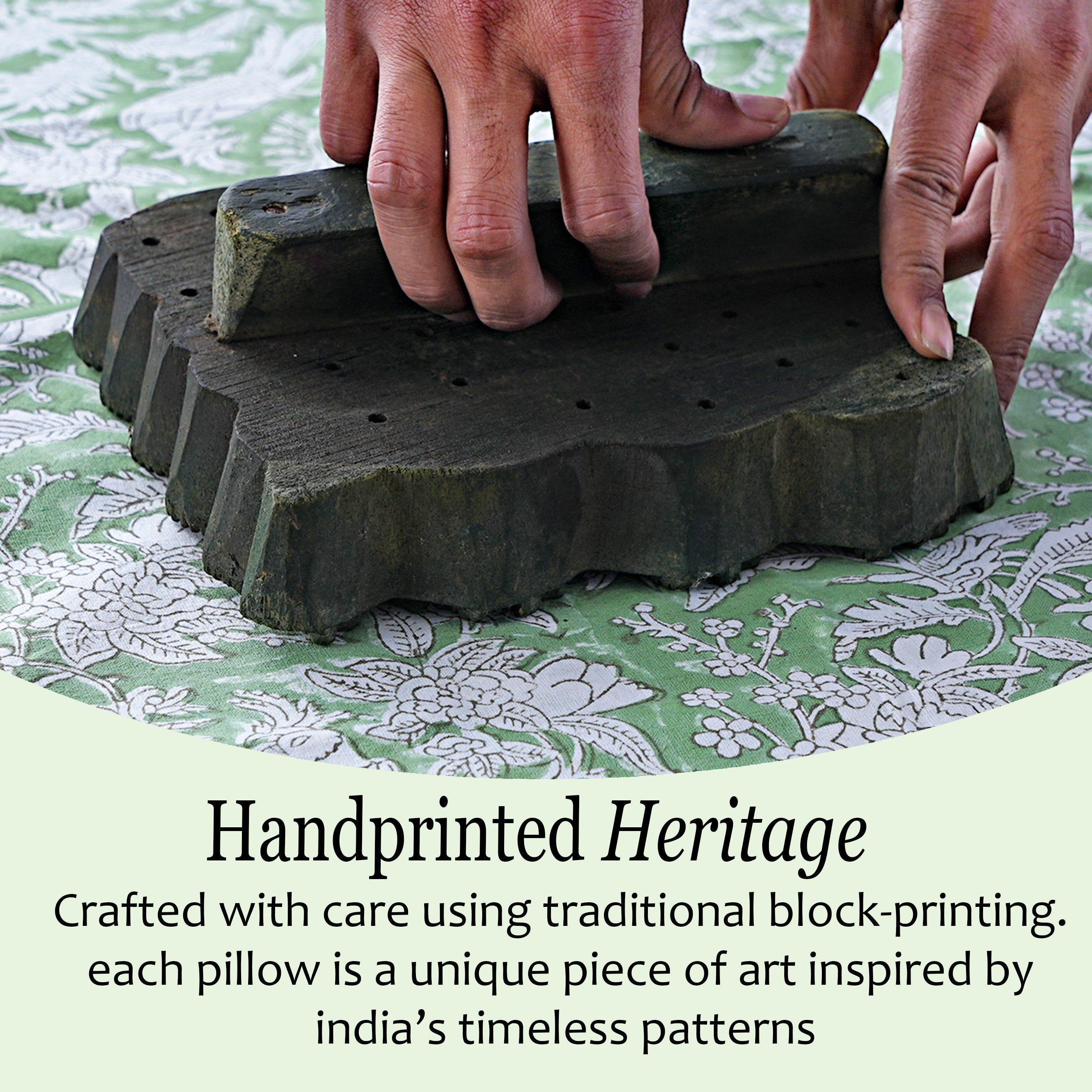 Handmade pillow with traditional block-printing technique on a floral fabric background