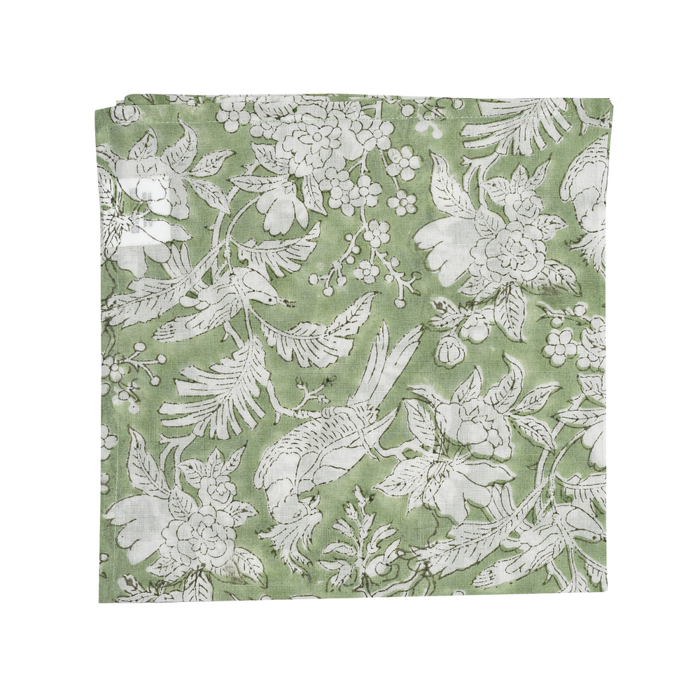 Flat lay of single folded green floral napkin