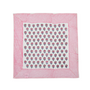 Single flat lay of pink and white floral cotton napkin.

