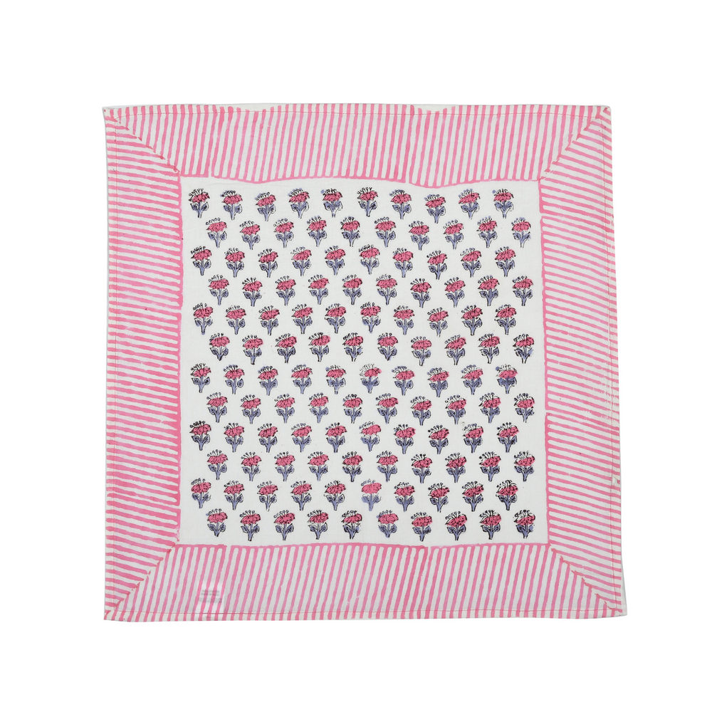 Single flat lay of pink and white floral cotton napkin.

