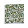 Single flat lay of green and white floral cotton napkin.

