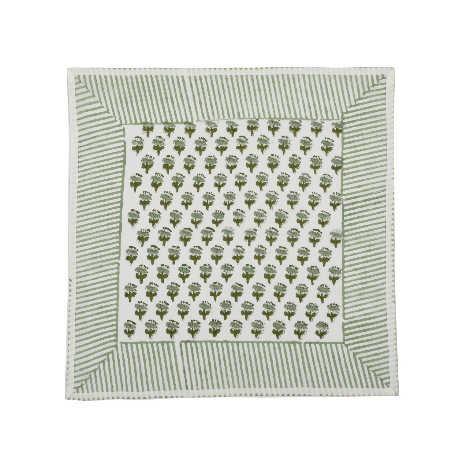 Green botanical block-printed cotton napkin in close-up.

