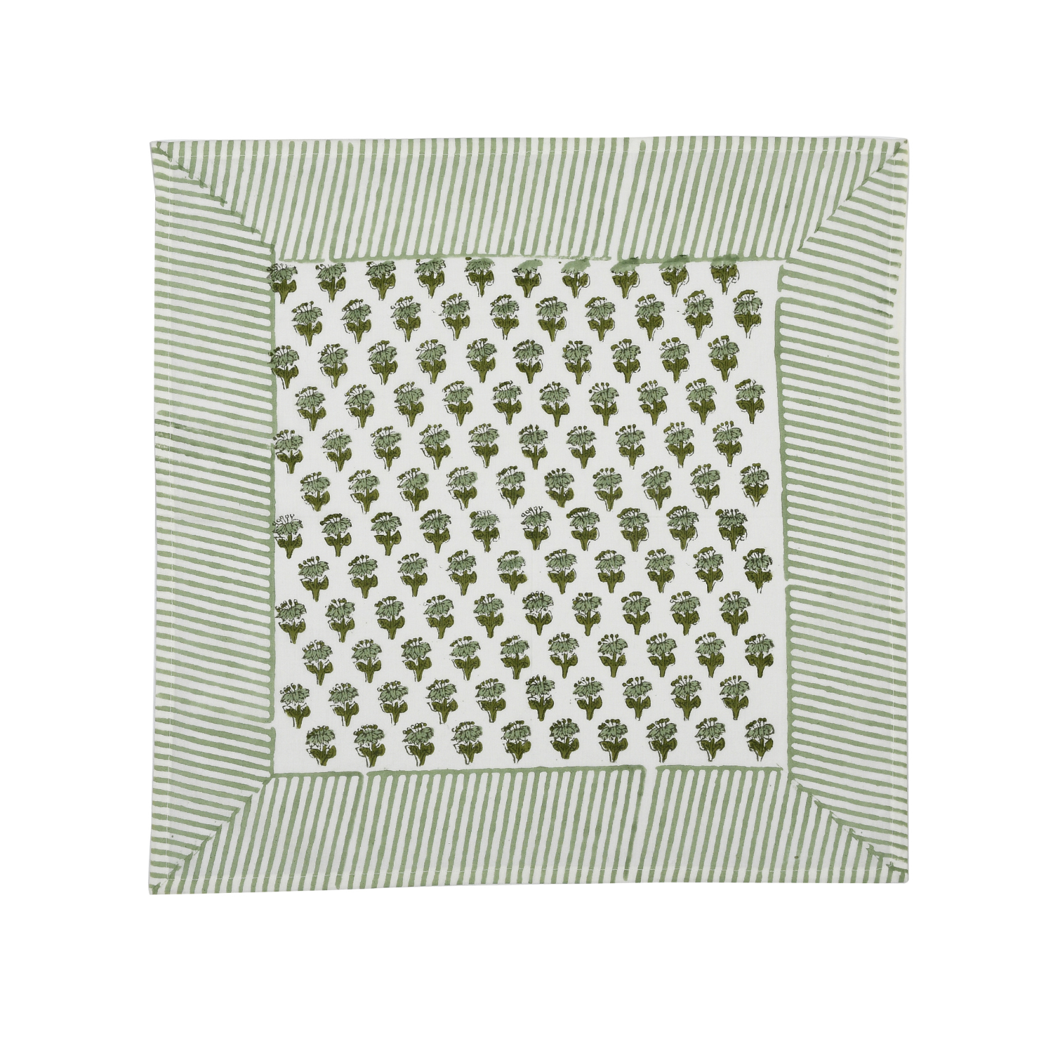 Green botanical block-printed cotton napkin in close-up.

