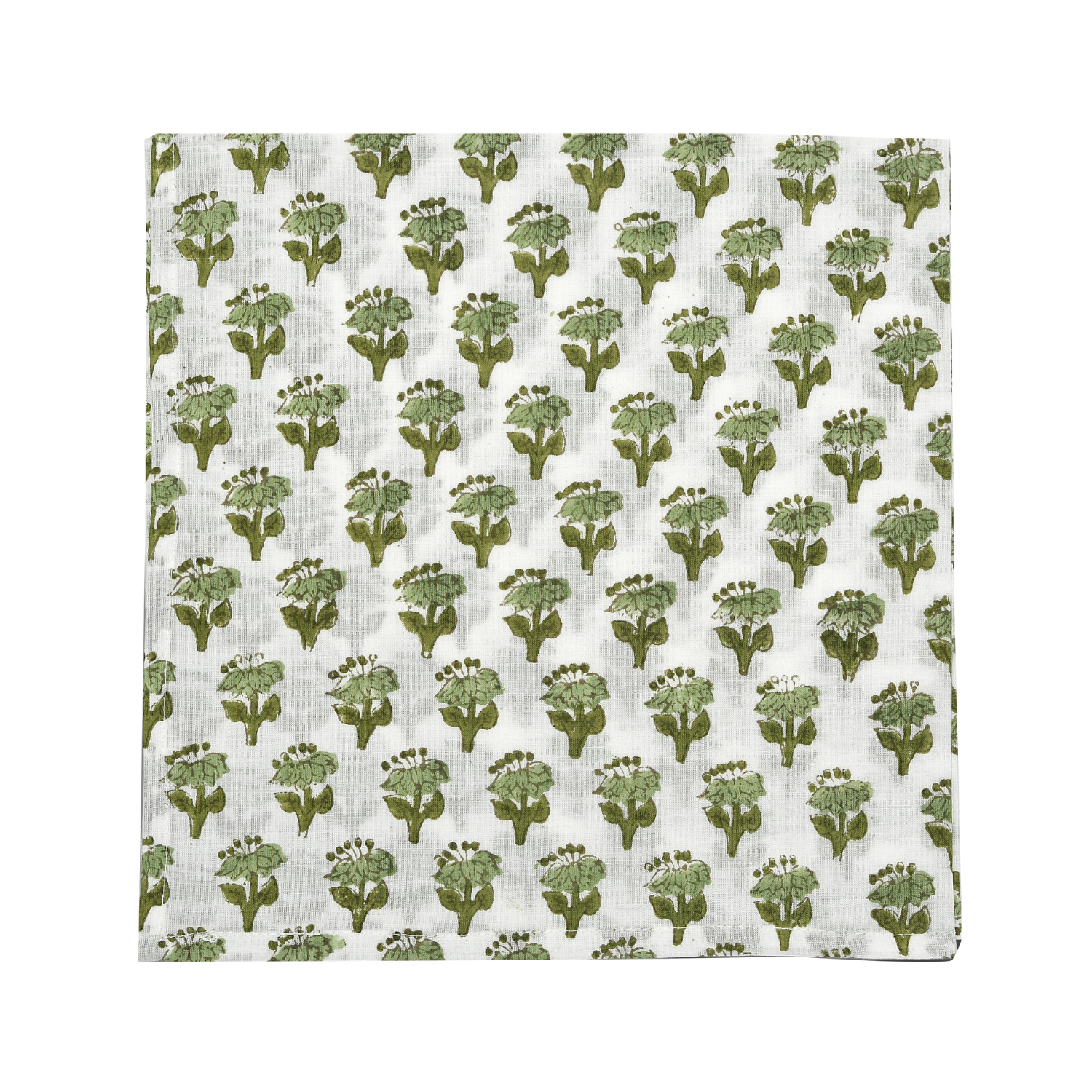 green floral block-printed napkin laid flat on white background.

