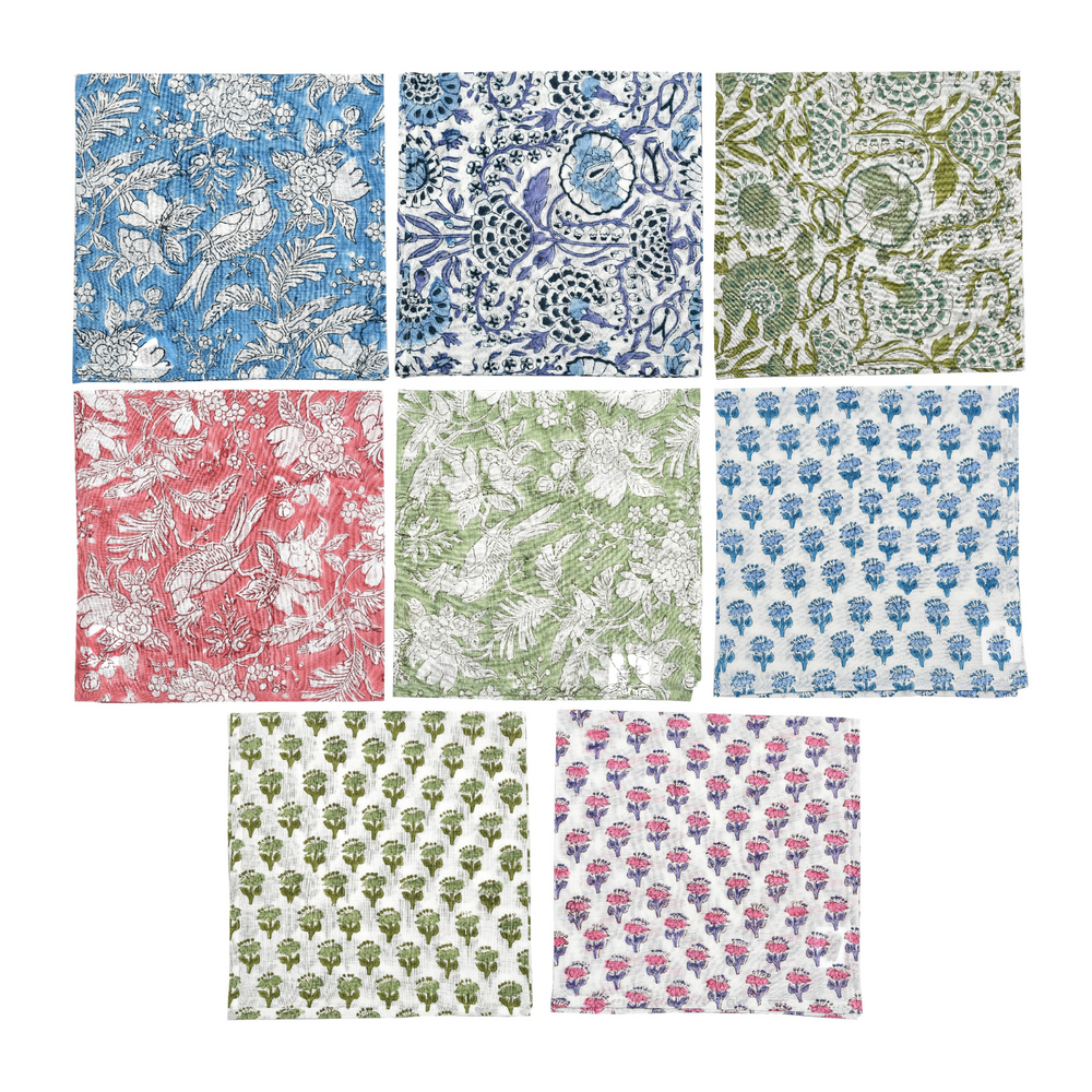 Grid preview of all five napkin print variants in one image on white background.


