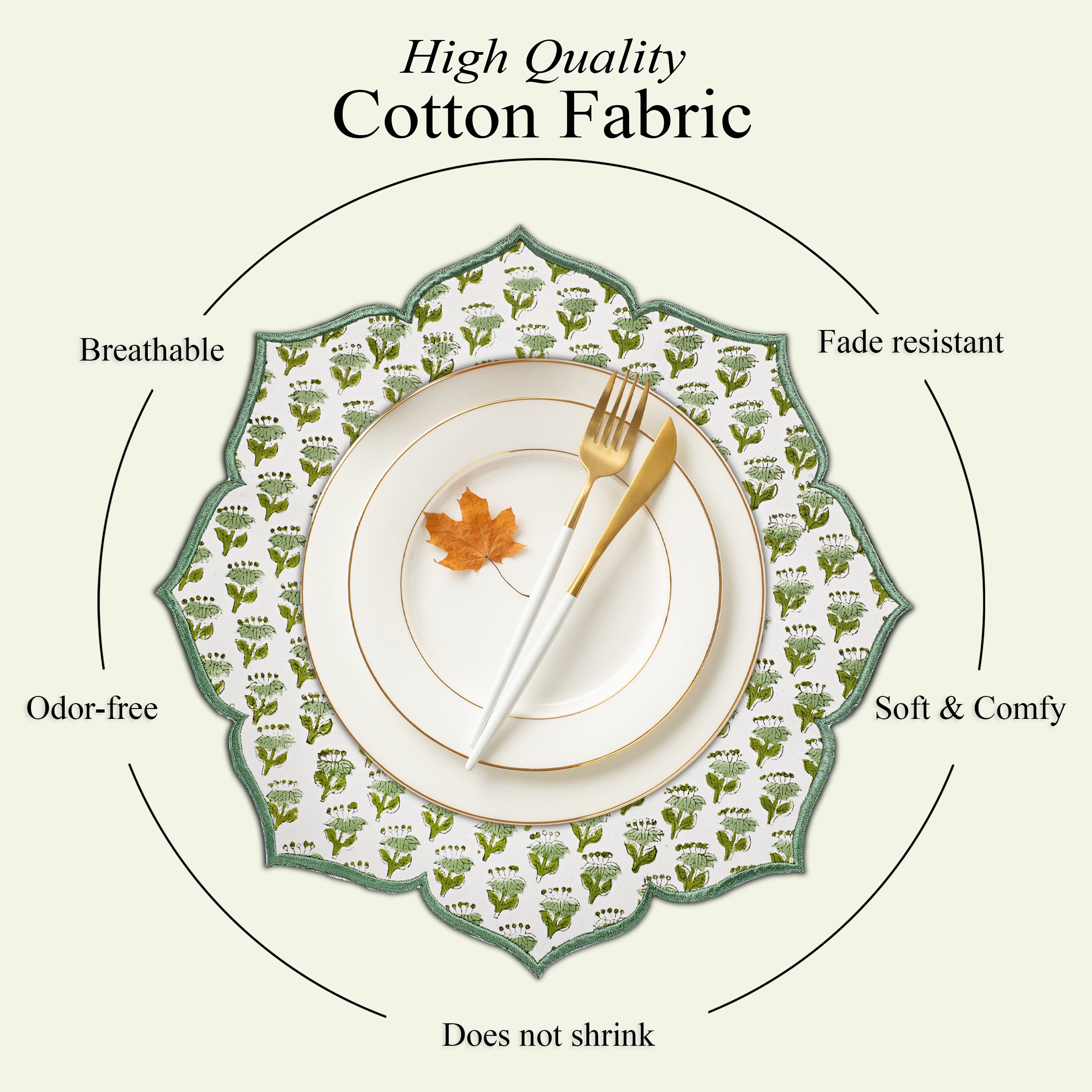 Emerald embroidered placemat styled with gold flatware