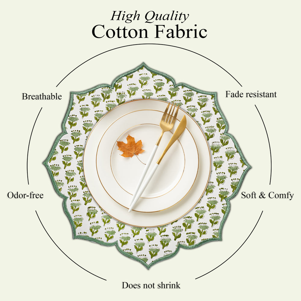Emerald embroidered placemat styled with gold flatware