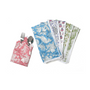 A set of colorful cotton cloth napkins with floral and geometric patterns, displayed fan-like.